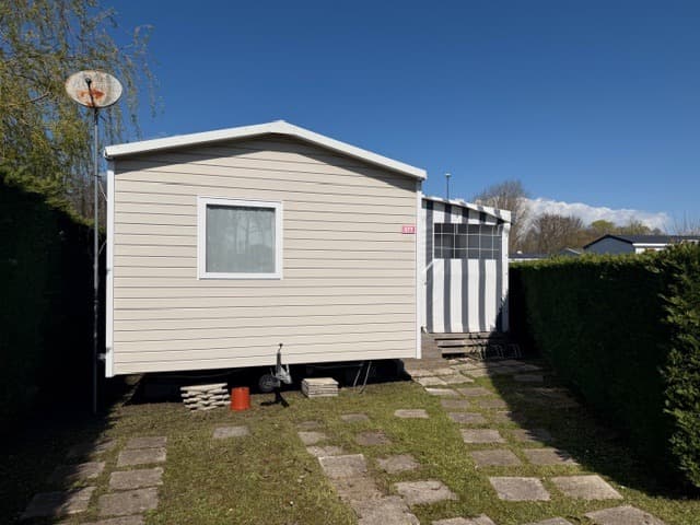 Salon et terrasse du mobil-home Mobil-home CC977 au camping Camping Les Charmettes, La Palmyre